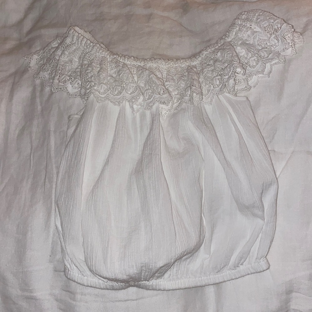 WOMEN’S MULTISTYLE TOP